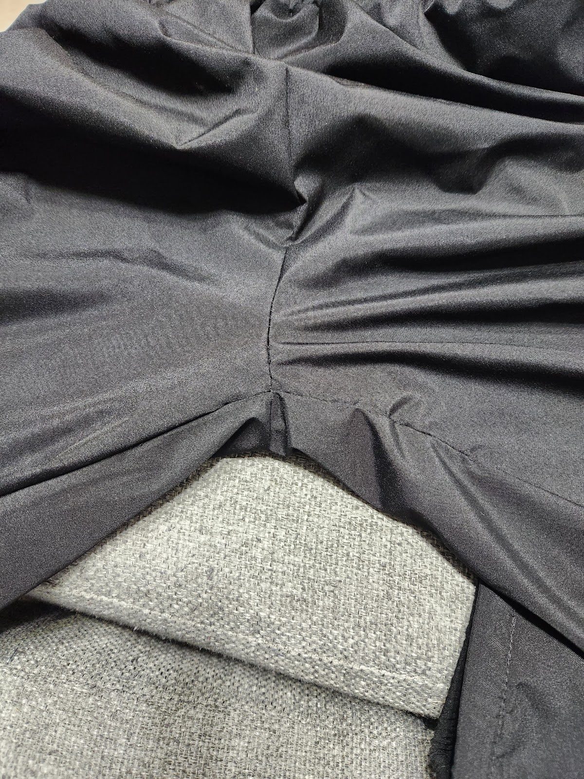 Clothing rack with finished alterations at Tailor Swift